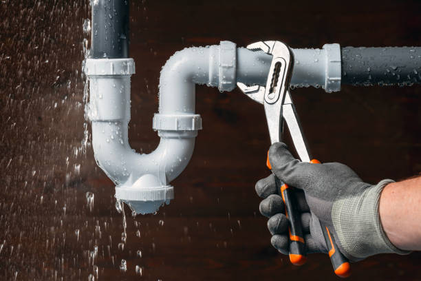 Professional Drain Cleaning technician working in Durham, NH